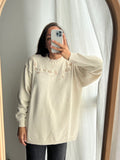 Maglione bianco con ricamo fiori