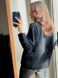 Cardigan nero traforato