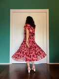 Abito con cintura lungo senza maniche fiorato rosa e bordeaux