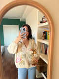 Cardigan crema con fiori