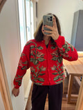 Cardigan rosso con fiori