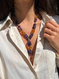 Collana con perle viola e arancioni