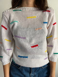 Maglione bianco righe colorate