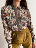 Camicia taglio maschile con riflessi dorati