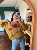 Maglione senape con fiore