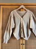 Cardigan con roselline