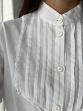 Camicia bianca maniche sbuffo e colletto coreana