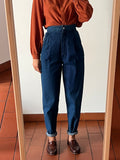 Pantaloni con pince di jeans