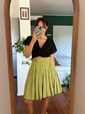Gonna di seta a pieghe verde