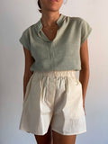 Blusa verdina di lino