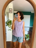 Top lilla con bottoni dietro