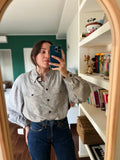 Camicia grigia con tasche