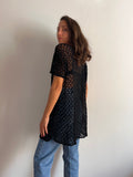 Maglia crochet nera lunga