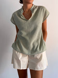 Blusa verdina di lino