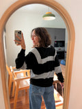 Pullover a righe grigie