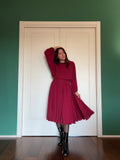 Abito lungo con cintura bordeaux