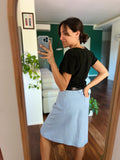 Gonna azzurra con bottoni
