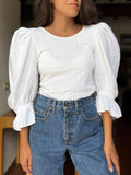Blusa bianca con maniche a sbuffo 2