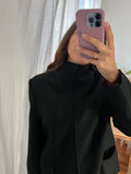 Giacca blu di lana a collo alto
