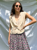 Top beige con incrocio