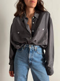 Camicia di seta grigia