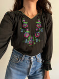 Blusa con ricamo colorato