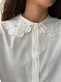 Camicia bianca con colletto grande