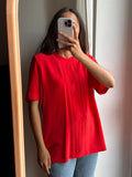Blusa rossa di seta