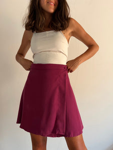 Gonna a portafoglio magenta