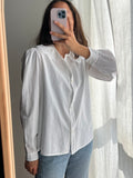 Camicia bianca con colletto grande