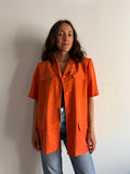 Camicia di seta arancione con cintura