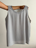 Top grigio perla scollo intrecciato