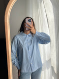 Camicia azzurra con collettino tondo