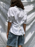 Camicia bianca con intreccio sul retro