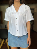 Camicia bianca con colletto grande quadrato