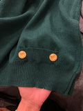 Maglione verde bottoni oro