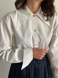 Camicia bianca con colletto lungo