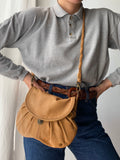 Borsa ocra con tracolla intrecciata