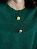 Maglione verde bottoni oro