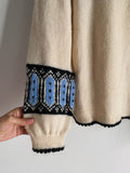 Maglione panna con maniche a sbuffo