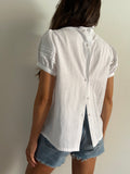 Camicia bianca con parte trasparente