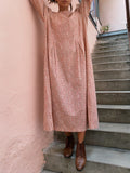 Abito rosa con gilet