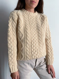Maglione in lanona panna intrecciato