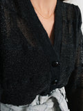 Cardigan nero luccicante