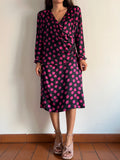Abito di seta a pois fuxia