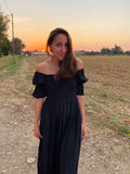 Abito lungo manica a sbuffo nero
