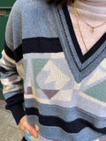 Maglione azzurro geometrico