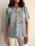 Cardigan mezza manica azzurro con ricami