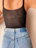 Top nero a costine con pizzo