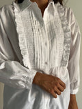 Camicia bianca con rouche